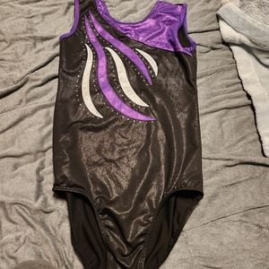 Black and purple gymnastics leotard